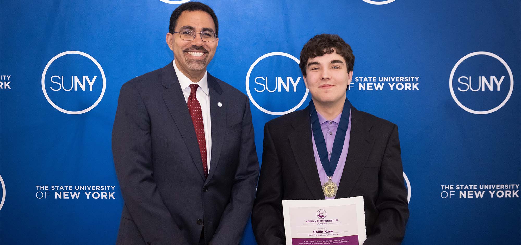 Collin Kane Receiving EOP award with SUNY Chancellor