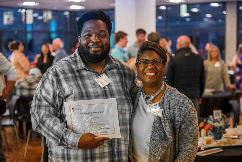 Former Trustee Nykole Parks with student